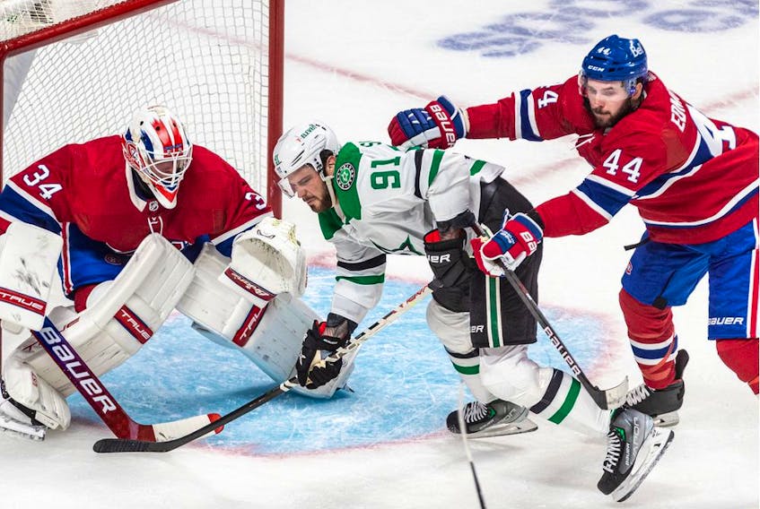 Canadiens defenceman Joel Edmundson received a cross-checking penalty after clearing Stars' Tyler Seguin from in front of Canadiens goaltender Jake Allen Thursday night at the Bell Centre.