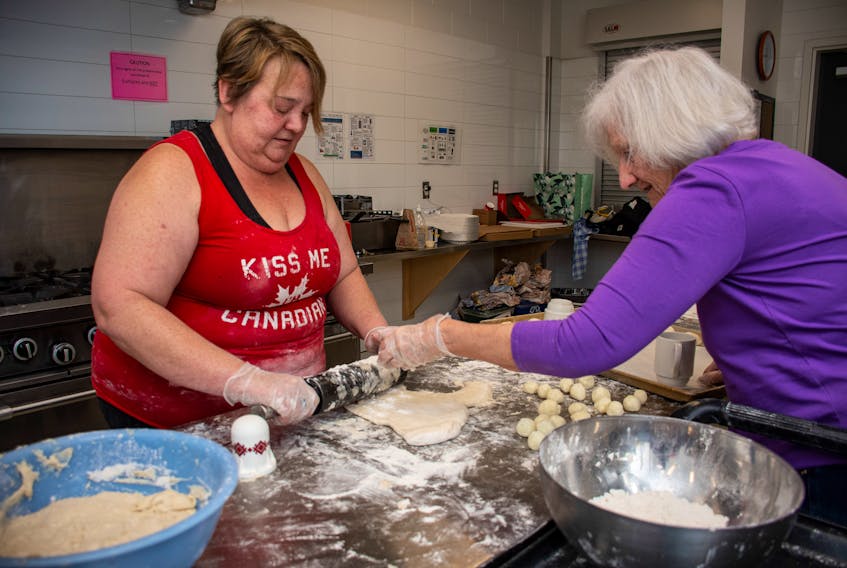 Maureen Fedorus (left) makes perogies with June Feswick at the Beaver Bank Kinsac Community Centre on Friday, March 18, 2022. The women were part of a crew making around 3300 perogies for a Ukraine fundraiser on April 2.
Ryan Taplin - The Chronicle Herald