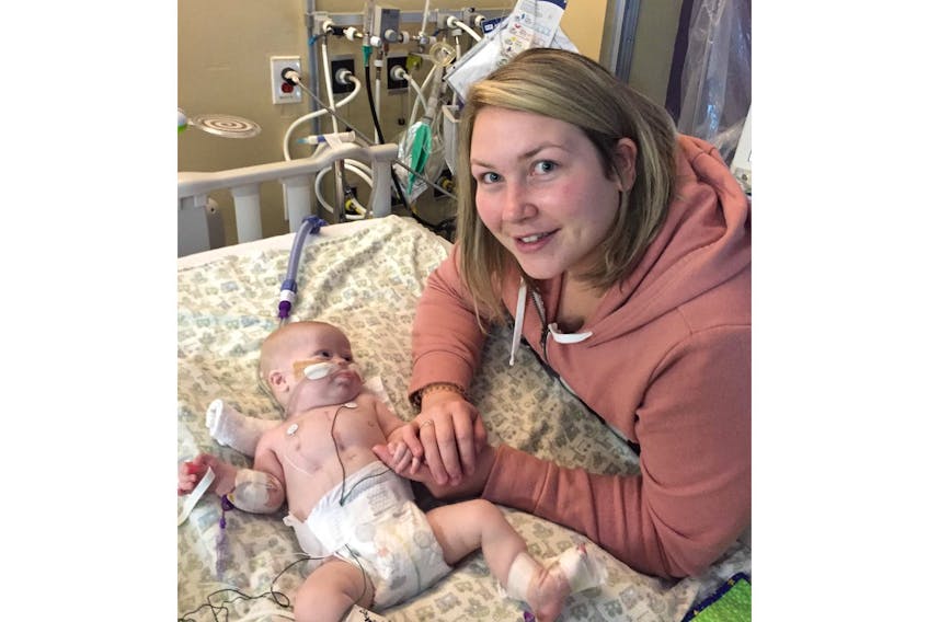 Meaghan Moore with her son, Finley, soon after he was born in June 2019. Finley died in October, but his legacy lives on in the Finley Mills Memorial Scholarship that will send a child or adult with Down Syndrome to Camp Tidnish for the next 10 years. Contributed