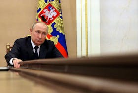 Russian President Vladimir Putin attends a meeting with government members via a video link in Moscow earlier this month. Documents seized by Ukrainian troops on March 2 suggest that Russie expected the military phase of the invasion to be completed within 15 days. - Sputnik/Mikhail Klimentyev/Kremlin via REUTERS