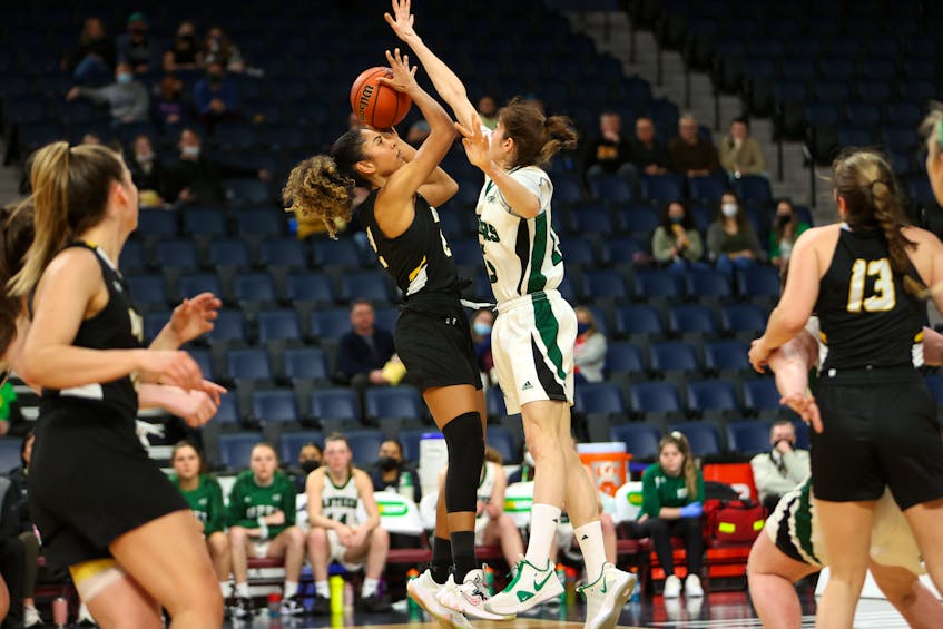 The UPEI Panthers’ Carolina Del Santo attempts to block a shot attempt by a Dalhousie Tiger in Atlantic University Sport women’s basketball quarter-final game at Scotiabank Centre in Halifax, N.S., on March 17. The Panthers won the game 69-50. Nick Pearce Photo/Courtesy of AUS