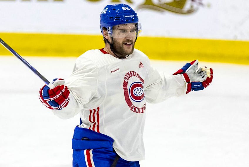 Canadiens' Jonathan Drouin gestures during a competition between the white squad and the red at practice at the Bell Sports Complex in Brossard on Jan. 10, 2022.  