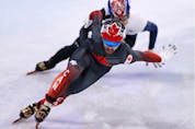  Canada’s Charles Hamelin skates during the 5,000-metre relay final at the Beijing Winter Olympics on Feb. 16, 2022.