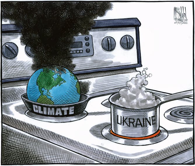 Stove containing a burning earth and a boiling over Ukraine BRUCE MacKINNON March 3, 2022