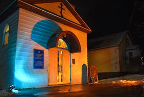 The Holy Ghost Ukrainian Catholic Church in Whitney Pier was lit up in blue and yellow, the colours of the Ukraine flag, on Wednesday night in support following the recent Russian invasion of the country. Approximately 100 people attended a church service at the Ukrainian Parish Hall Wednesday evening. JEREMY FRASER/CAPE BRETON POST