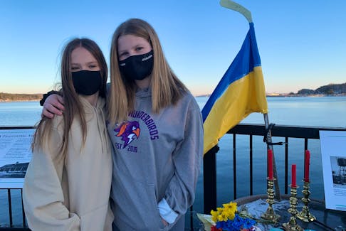 Lauren MacVicar, right, has been close friends with her Ukrainian classmate Olga Veres, left, since Veres moved to Halifax. They're pictured at Dewolf Park in Bedford on Tuesday, Mar. 1, 2022.
