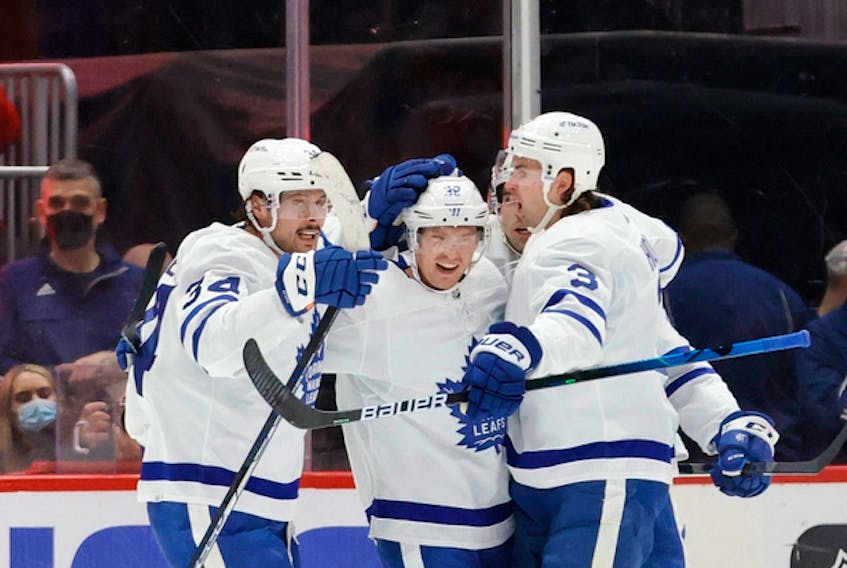 Maple Leafs defenceman Rasmus Sandin (38) is congratulated by teammates after scoring a goal against the Washington Capitals on Monday. Sandin moved up to a defensive pairing with Morgan Rielly at practice on Tuesday.