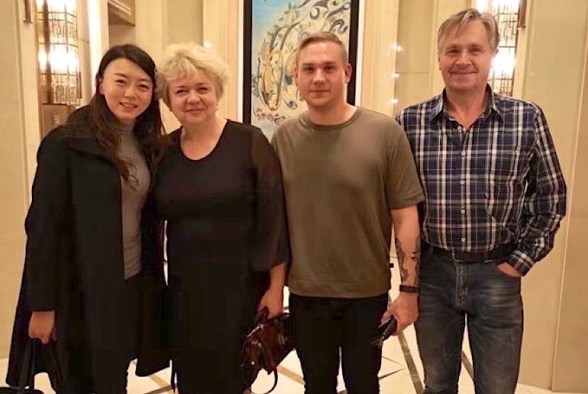 Daniil Titov, third from left, is seen with his wife Kalie Wang, from left, and parents Natlia and Sergey Titov in this 2018 photo. Natlia and Sergey arrived in Sydney March 14 after fleeing their home outside Kyiv, Ukraine. CONTRIBUTED