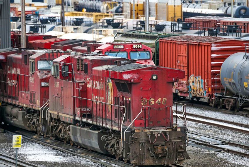 CP Rail trains are seen at the company’s Calgary Alyth Yards on Sunday, when operations were halted because of the labour dispute.