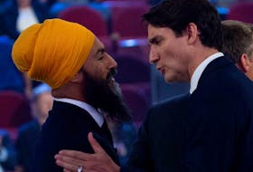 Liberal leader Justin Trudeau, right, and NDP leader Jagmeet Singh shake hands following a leaders' debate during the 2019 federal election. The NDP have agreed to support the Liberal government until 2025. 

