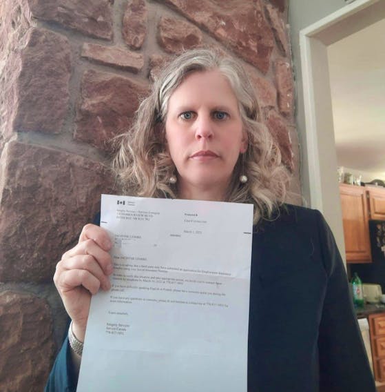 Jacinthe Lemire, holds the letter she received from Service Canada, where she learned a third party used her social insurance number to apply for employment insurance benefits. 