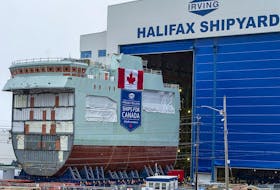The centre block of the future HMCS Max Bernays is moved from the fabrication building to dockside at the Irving Shipbuilding facility in Halifax in a file photo taken on Jan. 22, 2021. The vessel is Canada's third Arctic and Offshore Patrol Ship (AOPS) being built for the Royal Canadian Navy.