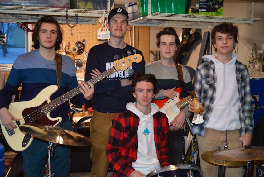 P.E.I. band The Darvel is releasing its debut self-titled album on April 14. They are, from left, Drew Cassibo, Sam Read, Lucas Proud (sitting), Lucas MacCormack and Malcolm Orford.