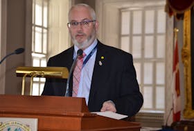 Justice Minister Brad Johns speaks at the Nova Scotia legislature Thursday, March 24, 2022, about amendments to the Protecting Access to Health Services Act that would prevent people from protesting outside the homes of senior health officials and other health service providers.