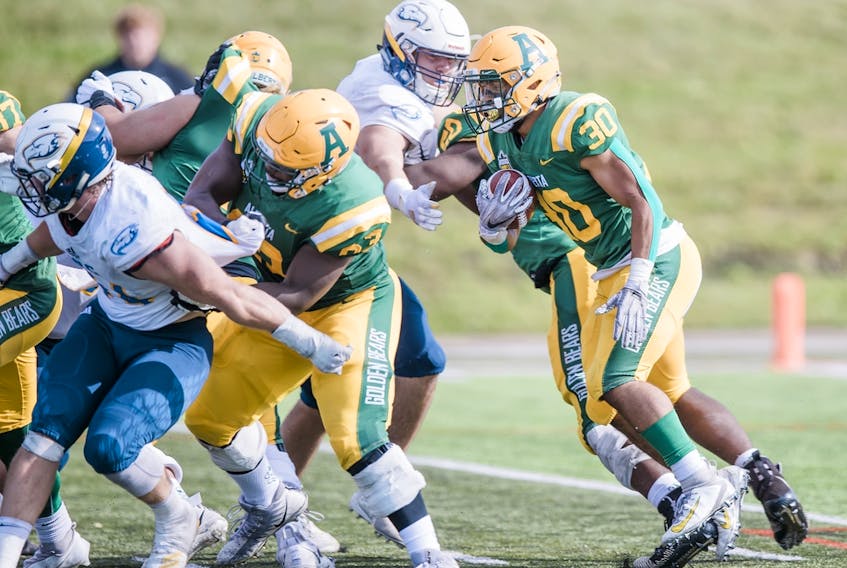 University of Alberta Golden Bears centre Rodeem Brown (63) is one of four players from the program among 52 prospects from across the country who has earned their way to the Canadian Football League national combine this weekend, ahead of the May 3 draft.