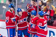  Montreal Canadiens right-wing Cole Caufield celebrates his goal against the Dallas Stars during the second period at the Bell Centre in Montreal on March 17, 2022.