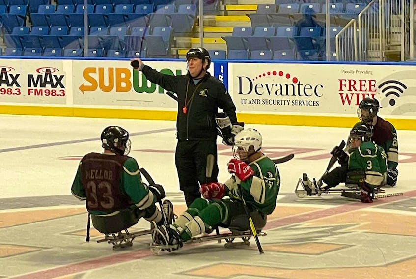 Cape Breton Sledgehammers head coach Steve Deveaux prepares to drop the puck during a practice at Centre 200 earlier this season. The Sledgehammers will host the Danny O’Neill Memorial Sledge Hockey Tournament this weekend at Centre 200 in Sydney. PHOTO CONTRIBUTED.