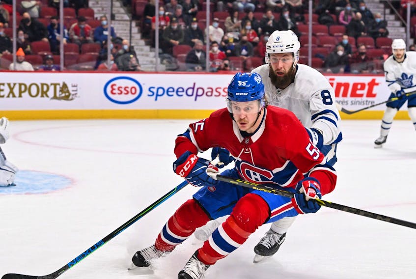Michael Pezzetta of the Montreal Canadiens and Jake Muzzin of the Toronto Maple Leafs skate against each other during the second period at the Bell Centre on Feb. 21, 2022 in Montreal.  