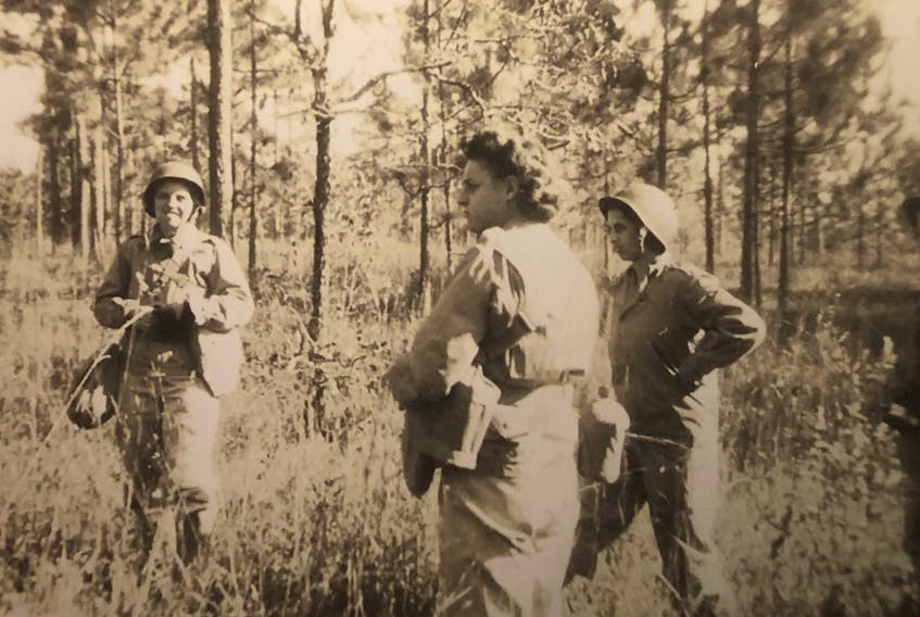 Lt. Catherine Wells is pictured in foreground. This was one of the photos found in an ammunition can in a war memorabilia room in Amherst in 2018.