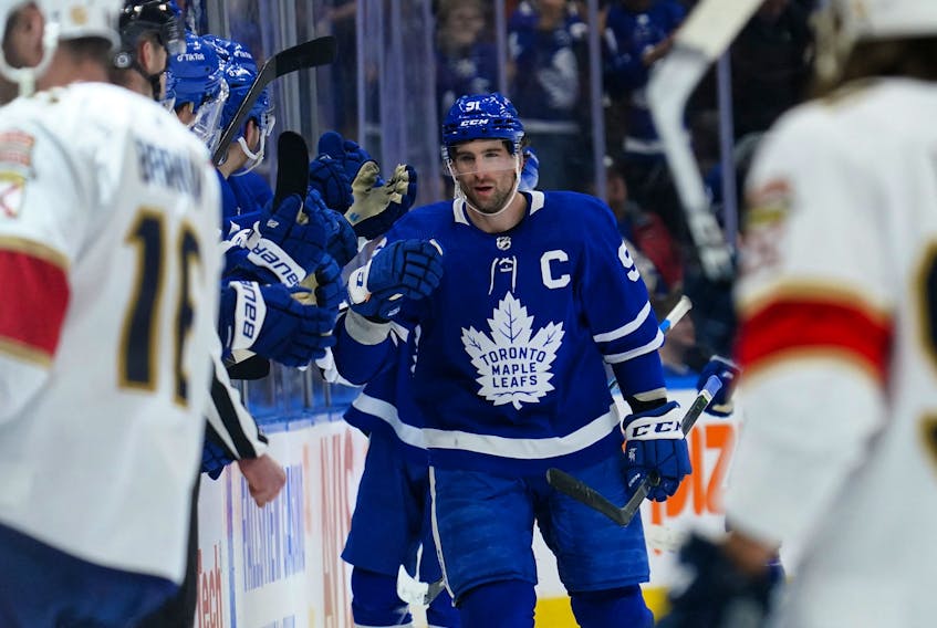 Maple Leafs' John Tavares is congratulated after scoring during the second period against the Florida Panthers at Scotiabank Arena on Sunday, March 27, 2022. 