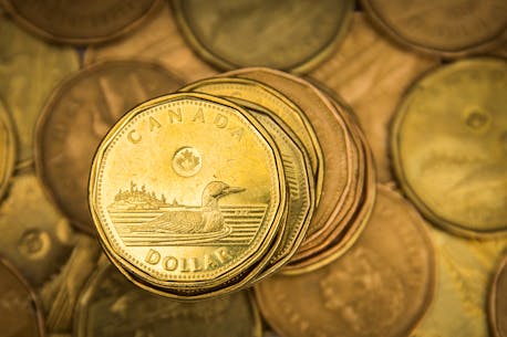 Canadian dollar snaps winning streak as oil prices slide
