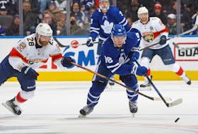Claude Giroux of the Florida Panthers skates to check Maple Leafs' Mitch Marner at Scotiabank Arena on Sunday, March 27, 2022. 