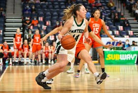 The UPEI Panthers’ Devon Lawlor controls the ball against the Cape Breton Capers in an Atlantic University Sport (AUS) women’s basketball semifinal in Halifax on March 19. Although the Panthers lost the game 74-54, the team has been selected as a wild-card recipient for the 2022 U SPORTS women’s basketball championship this week in Kingston, Ont. 