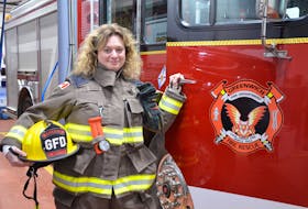 Greenwich firefighter Amy Schofield considers her fellow members her “fire family.” The department has been serving the community for nearly 90 years. KIRK STARRATT