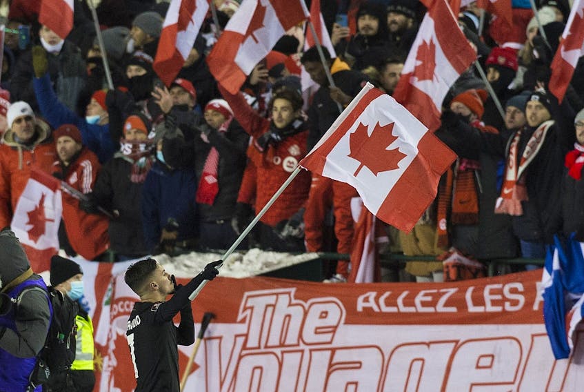 Team Canada celebrates after defeating Team Mexico 2-1 at the FIFA 2022 World Cup qualifier at Commonwealth Stadium on Nov. 16, 2021, in Edmonton.