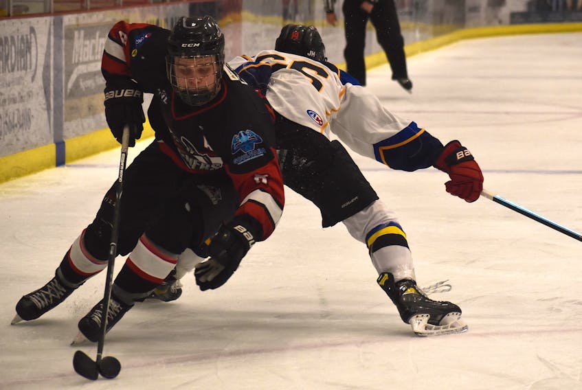 Blake Cox of the Membertou Jr. Miners, left, blows past Noah Sutherland of the Cumberland County Blues during Game 1 of the Nova Scotia Junior Hockey League best-of-five playoff series at the Membertou Sport and Wellness Centre on Wednesday. Membertou won the game 10-1. JEREMY FRASER/CAPE BRETON POST.