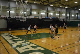 Devon Lawlor drives to the basket against Lauren Rainford during a UPEI women’s basketball team practice at the Chi-Wan Young Sports Centre in Charlottetown earlier this week. The UPEI basketball teams host Acadia on March 5 and St. Francis Xavier on March 6.