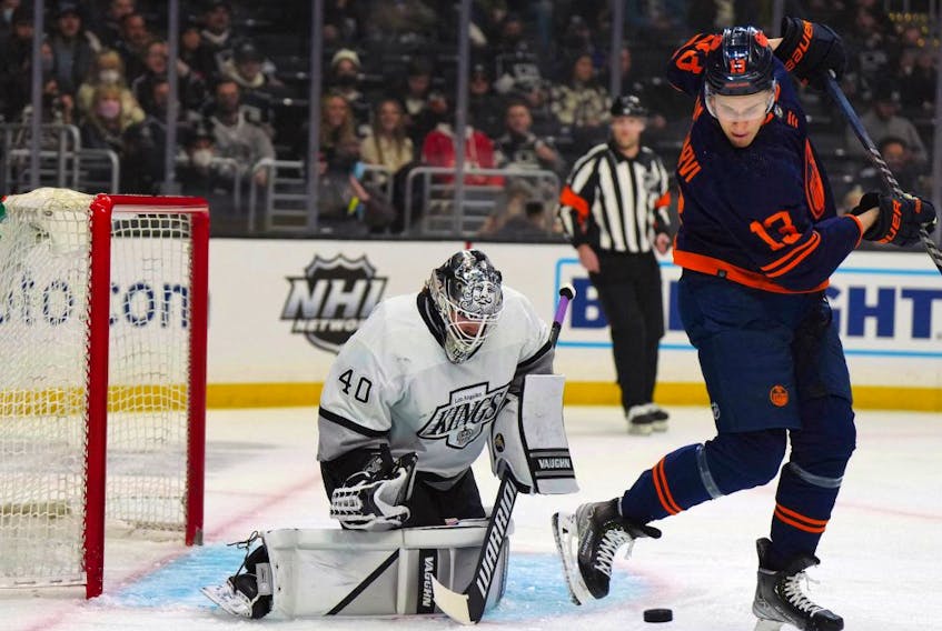 LA Kings goaltender Cal Petersen (40) defends the goal against Edmonton Oilers right wing Jesse Puljujarvi (13)  in the first period at Crypto.com Arena. 