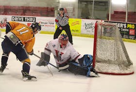 Valley Wildcats goalie Antoine Lyonnais makes a pad save on Yarmouth Mariners forward Ben Charles March 26 during Maritime Junior Hockey League playoff action at the Kings Mutual Century Centre in Berwick.