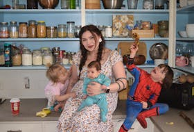 Jennifer Hubbert, centre, isn't afraid to show the chaotic side of motherhood and she's hoping the pilot issue of "Motherhood Revealed" will show others their not alone. Hubbert's children are two-year-old Clementine, from left, two-month-old Daisy and four-year-old Elliot. CONTRIBUTED