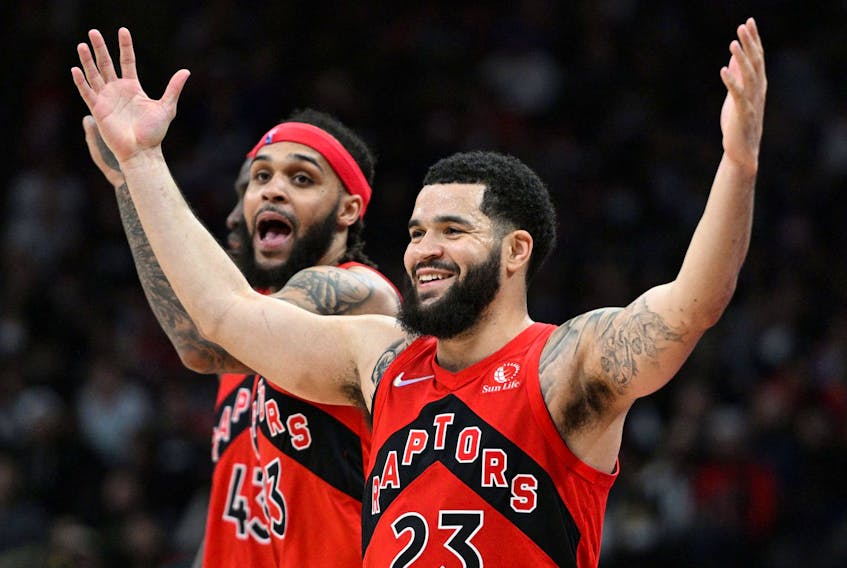 Toronto Raptors guard Fred VanVleet (23) celebrates after causing a turnover as guard Gary Trent Jr. (33) reacts in the against the Minnesota on Wednesday. 
