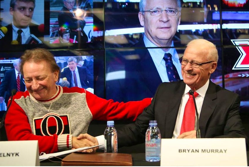  Eugene Melnyk shares a laugh with Bryan Murray on Dec. 16, 2016 when Murray was inducted into the Ring of Honour at the Canadian Tire Centre.