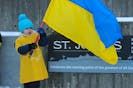 Maxim Elmelisi, 4, waves a Ukrainian flag during a late February rally in support of Ukraine at St. John’s City Hall. The province, as is the rest of Canada, is preparing to welcome people fleeing the war in Ukraine.

