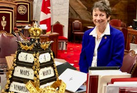 Former senator Diane Griffin is pictured in the Senate of Canada chamber with the mace. Griffin retired from the Senate of Canada on March 17.