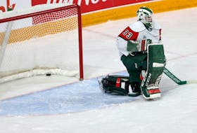 Halifax Mooseheads goalie Brady James looks on after the herd gave up their 4th goal of the 1st period against the Acadie-Bathurst Titan during QMJHL action in Halifax Froday March 25, 2022.

TIM KROCHAK PHOTO