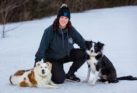 Cheryl Perry of Harrington, PEI  is pictured with her dogs, Amie and Archer. During COVID, when her wedding photography business dried up, Perry branched out to launch a pet photography business.