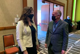 Brenda Gallant, left, director of marketing for Tourism P.E.I., talks with Gary Klassen, tourism strategist, during a break at the province’s 2022-23 tourism strategy and marketing launch in Charlottetown on March 4.

