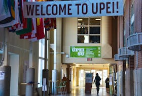 A student walks in the UPEI student centre. The university has confirmed it will delay the beginning of its faculty of medicine to fall 2024, one year later than its announced opening date as of last October.