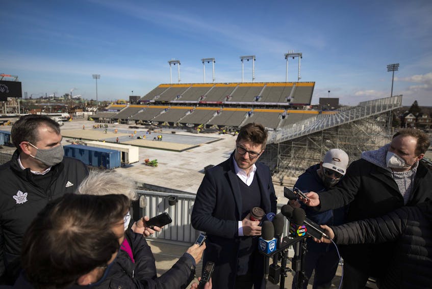 Toronto Maple Leafs general manager Kyle Dubas speaks to the media at Tim Hortons Field ahead of the NHL Heritage Classic outdoor game in Hamilton, Ont., Friday, March 4, 2022. The Buffalo Sabres and Toronto Maple Leafs will face off in the 2022 Heritage Classic later this month.  