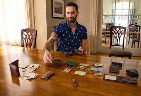 Jamie Urquhart, communications manager at the Waegwoltic Club, displays some old wallets and items on Friday, March 4, 2022. The wallets, which date back to the 1950s were recently found during some demolition work.
Ryan Taplin - The Chronicle Herald