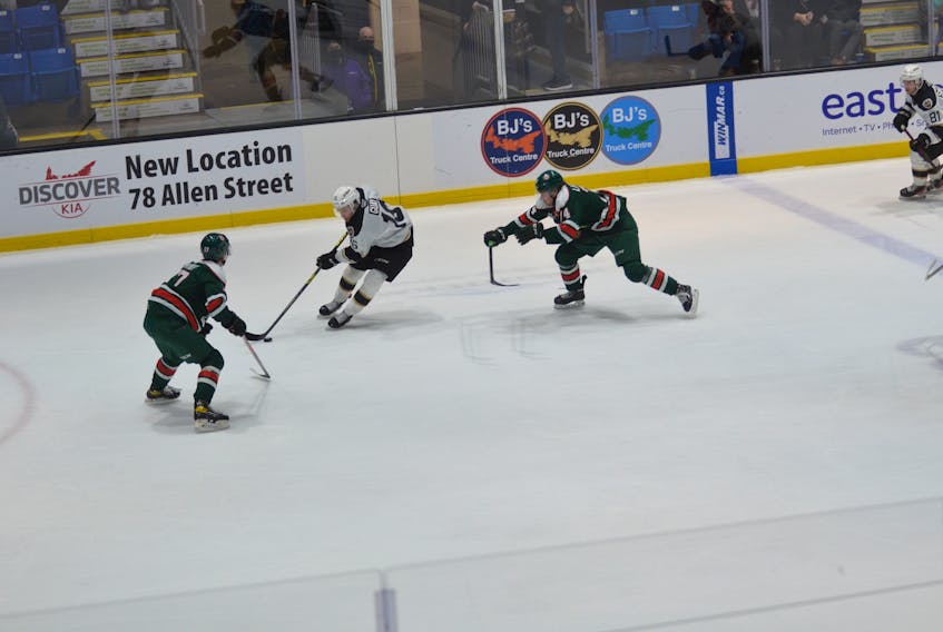 Charlottetown Islanders forward Patrick Guay carries the puck into the offensive zone during a Quebec Major Junior Hockey League game against the Halifax Mooseheads at Eastlink Centre on Feb. 26. Guay scored back-to-back winning goals in two games in Quebec over the weekend.