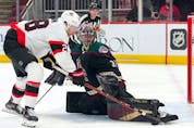  Coyotes goaltender Scott Wedgewood (31) makes a save against Senators right-winger Connor Brown during the first period.