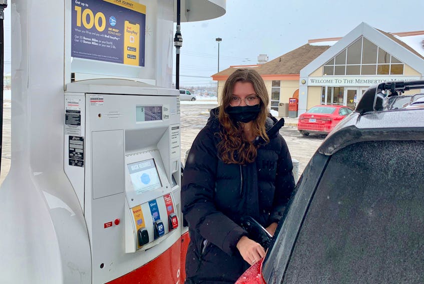 Brianna Stott put gas into her vehicle for the first time since the price of a litre of regular gasoline soared to a minimum of $1.772. The Sydney River woman said she ended up purchasing less fuel than she would usually have bought. DAVID JALA/CAPE BRETON POST