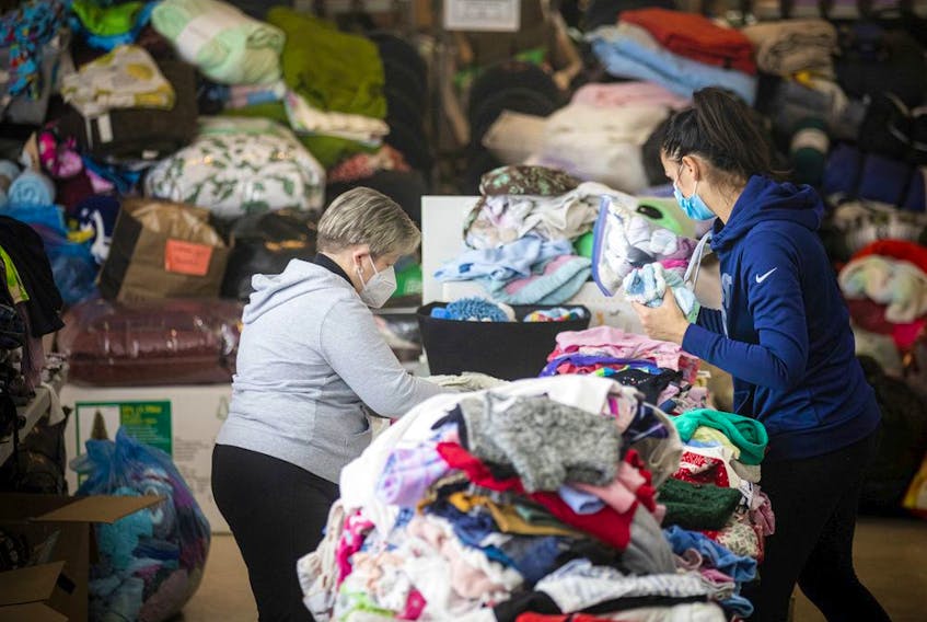  Ottawa’s Ukrainian Orthodox Hall was filled to the brim with donations and volunteers sorting what the community dropped off to be shipped to Ukraine and gathered for refugees who might eventually land in Ottawa.