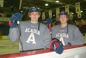 Colin Marshall, left, and Andrew Burden are back playing high-level hockey after the Acadia Axemen ran short on players. 
Jason Malloy
