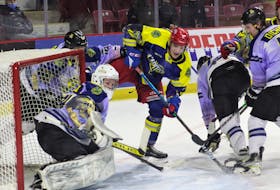 Summerside Western Capitals forward Jacob Stewart battles in front of the net in first period action between the Capitals and Campbellton Tigers on Saturday, March 5. The Capitals won the game 5-1 on the back of a four-goal outburst in the first period. 